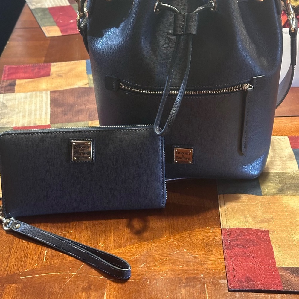 Dooney & Burke Saffiano Drawstring handbag and wallet in color Marine